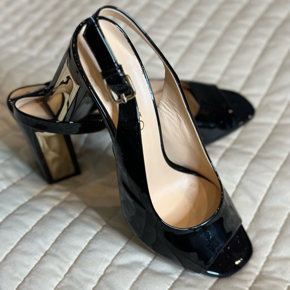 Poletto black heels with gold detailing
